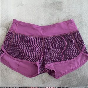 Purple and black lululemon speed up short